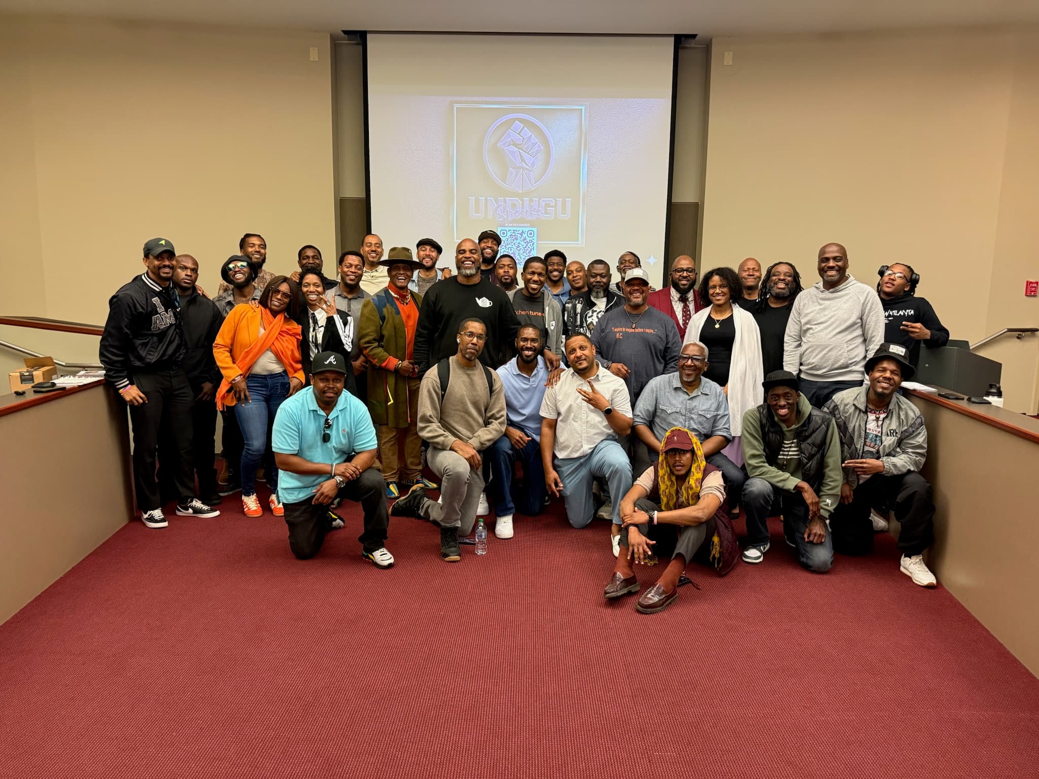 Full attendance at Undugu Speaks — brothers filling the room